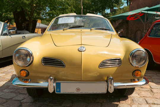 Yellow Volkswagen Karmann Ghia Convertible Front View