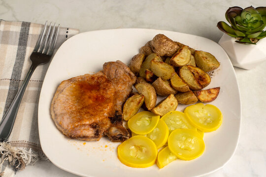 pork chop with summer squash and potatoes