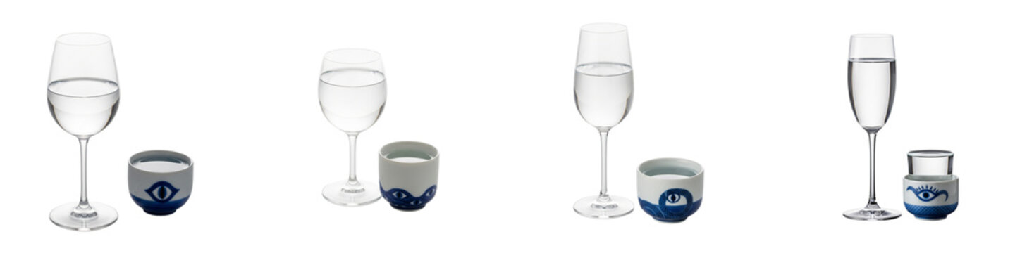 Set of diverse water glasses and traditional sake cups isolated on black