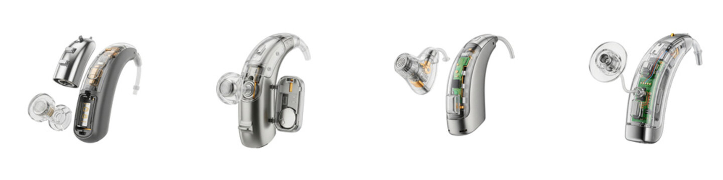 Set of modern hearing aids with internal electronic components isolated on black