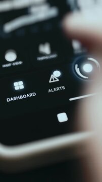 Dashboard And Alerts Icons Lit Near The Edge Of A Monitoring Tablet