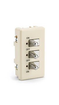 Beige triple toggle light switch module with exposed wiring terminals for electrical installation