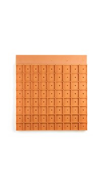 Orange plastic grid mat with square holes for industrial drainage and safety surface flooring