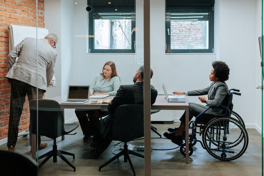 Diverse business team collaborating during a corporate meeting