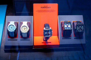 Obraz premium Luxury TAG Heuer Watches on a Showcase Display with Formula One and Monaco Collections for Retail. TAG Heuer Logo store shop. Como, Italy - June 24, 2026