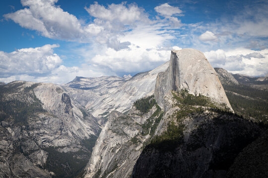 Majestic Yosemite Valley Landscape featuring Half Dome and Sierra Nevada Mountains on a Cloudy Day