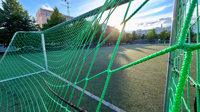 View Through Soccer Goal Net over Artificial Turf Field