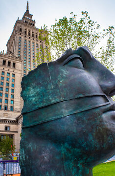 Warsaw, Poland - July 6th 2026: The bronze head sculpture displayed near the Palace of Culture and Science, titled "Tindaro" by the Polish artist Igor Mitoraj