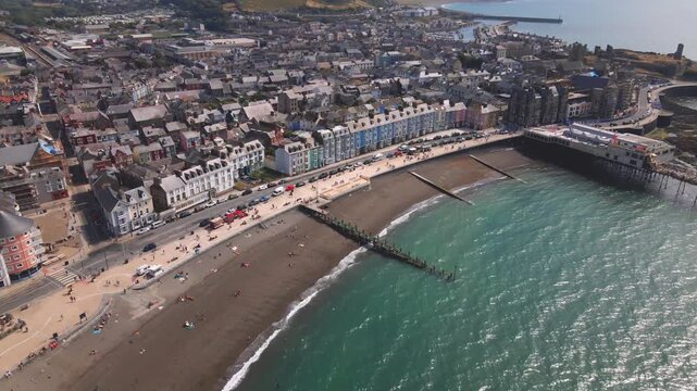 Aberystwyth pier beach promenade seafront town aerial drone view