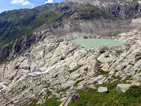 Glacier-polished granite bedrock slabs with a meltwater cascade