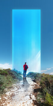 Solo hiker standing before giant blue virtual screen on rocky trail. Concept of AI navigation and future travel for smart tourism, mobile technology and outdoor advertising.