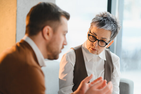 Psychologist counseling client offering professional mental health support