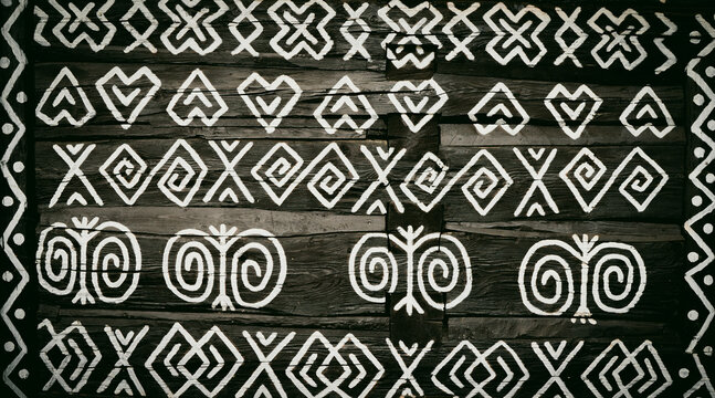 Cicmany Village Traditional Wooden House Wall Background Featuring Iconic White Geometric Folk Ornament Patterns Carved On Dark Timber Surface Slovak Cultural Heritage Architecture Folklore Decor