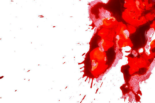 Vibrant red paint or blood splatter with textured edges on a dark black background, ideal for abstract horror and suspense concepts