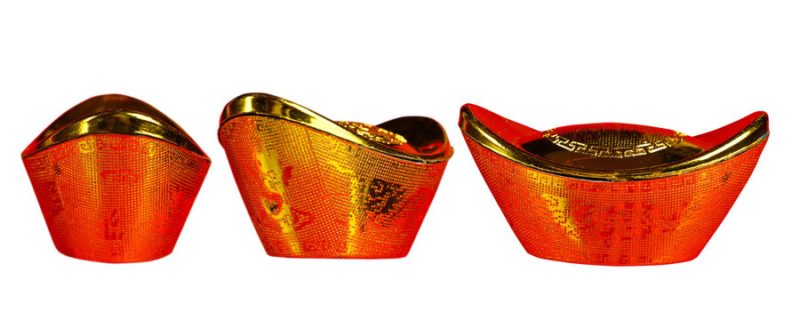 Three gold and orange Chinese sycee ingots shown from different angles on a black background, representing wealth and prosperity