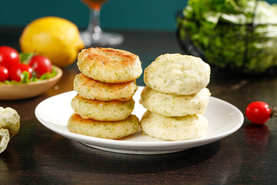 Homemade Seafood Patties with Herbs and Fresh Vegetables