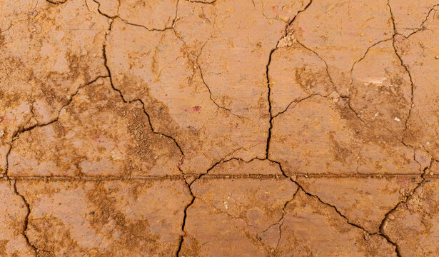Cracked red clay soil texture Papua