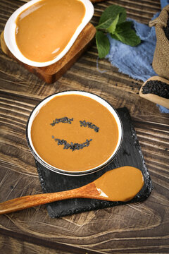 Hot Pure Sesame Sauce with Smiley Face Pattern - Traditional Asian Dipping Sauce in Ceramic Bowls