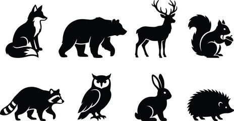 Black vector silhouettes collection of wild forest animals, featuring fox, bear, deer, squirrel with acorn, raccoon, owl, rabbit, and hedgehog © Shariful