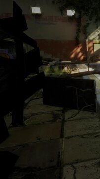 A black chair sits in a cluttered area with plants and shadows. Sunlight streams through trees, creating patterns on the ground. Nearby items are scattered in disarray.