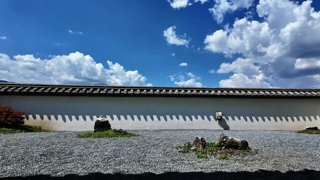 Time Lapse Blue Sky White Clouds Over Traditional Japanese Zen Garden Wall Gravel Stone Landscape