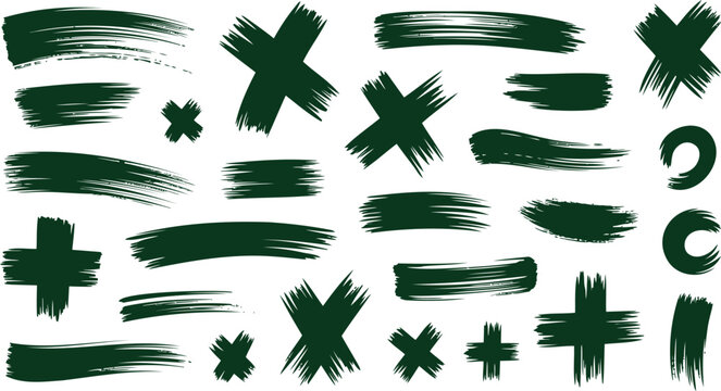 Assortment of vibrant green brush strokes featuring X marks plus signs and various textured lines