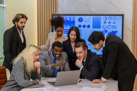 Diverse colleagues gather in brainstorm discuss statistics together. Group of people colleagues gather doing Brainstorming business plan together. Team Brainstorm Working Concept.