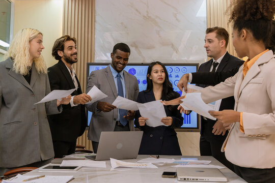 Diverse colleagues gather in brainstorm discuss statistics together. Group of people colleagues gather doing Brainstorming business plan together. Team Brainstorm Working Concept.