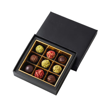 Luxury assorted chocolate truffles in elegant black gift box for gourmet celebrations
