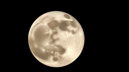 Fototapeta premium A detailed close-up of the full moon showcasing its craters against a dark space backdrop.