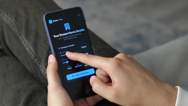 Smartphone mortgage planning tool with changing loan parameters, reflecting the evolution of online banking, property investment, and personalized financial management.