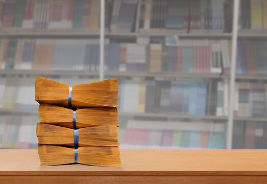 A brown A4-sized envelope lay on a table in the library.