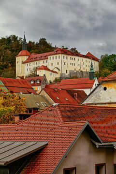 The castle (Loski Grad), below Krancelj hill, overlooks the red roofs of the town center buildings on a rainy autumn morning. Skofja Loka-Slovenia-139