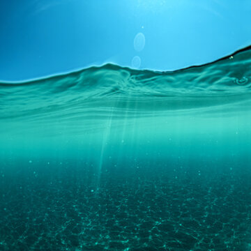 Clear ocean water surface and underwater view.
