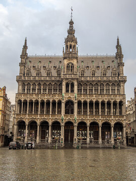 Wide view of the famous Grand Place featuring the historic Town Hall and ornate guild houses in the heart of Brussels.