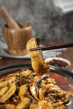 Spicy Blackened Fish Fillet with Red Chili Oil Hot Pot Asian Cuisine Chopsticks