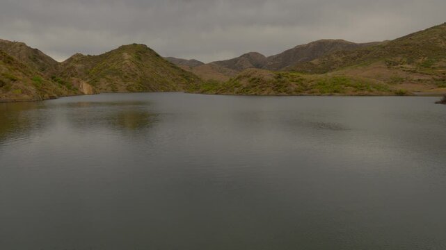 Santivanez dam reservoir lake surrounded by mountains in Cochabamba