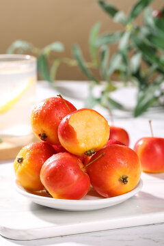 Fresh Wild Apples with Sweet Flesh on White Plate - Healthy Organic Fruit from Shaanxi Province