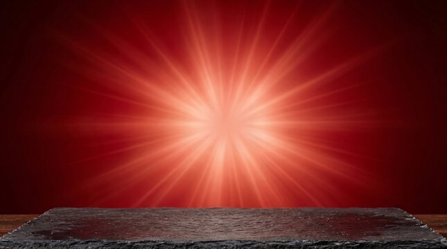 Empty dark stone slate stage on a wooden table with dramatic bright red starburst background platform background starburst dramatic showcase