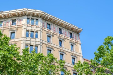 Elegant European Building Facade, Barcelona, Ornate Classical Sculptures, Decorative Painted Panels © ikuday