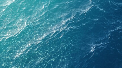 Obraz premium Calm ocean water surface with gentle waves in bright sunlight 