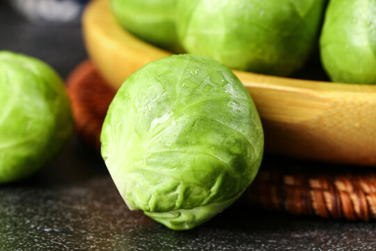 Fresh Brussels Sprouts from Holland - High Quality Imported Vegetables in Wooden Bowl