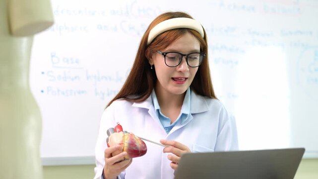 Video call Science teacher explaining anatomy to students in Classroom