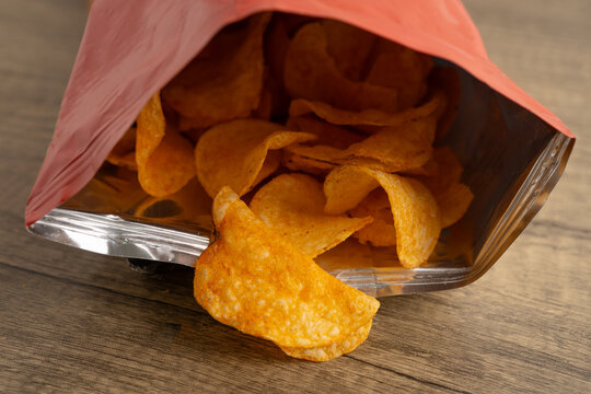 Potato chips , delicious BBQ seasoning spicy for crips, thin slice deep fried snack fast food.