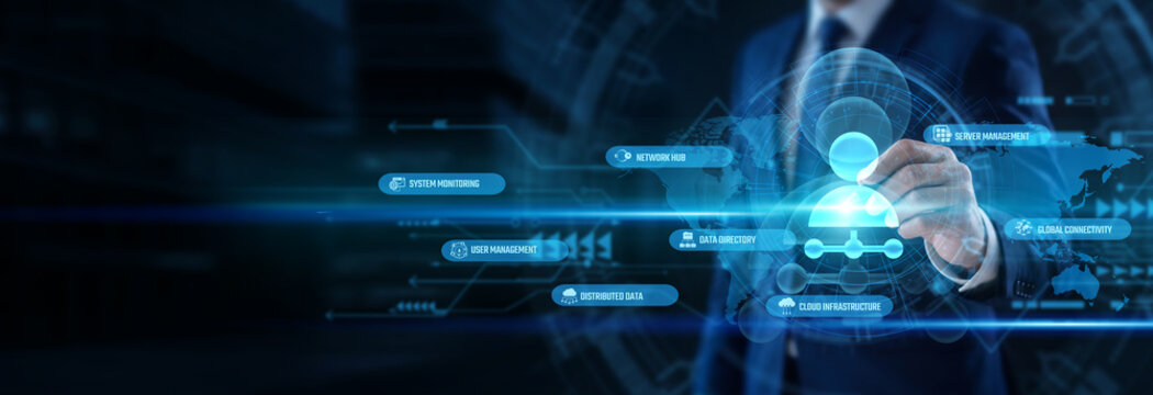 IT systems manager whose focused hand has a pen designing Network Admin systems network solutions securely protecting data. Professional administrator continuously operates a global business.