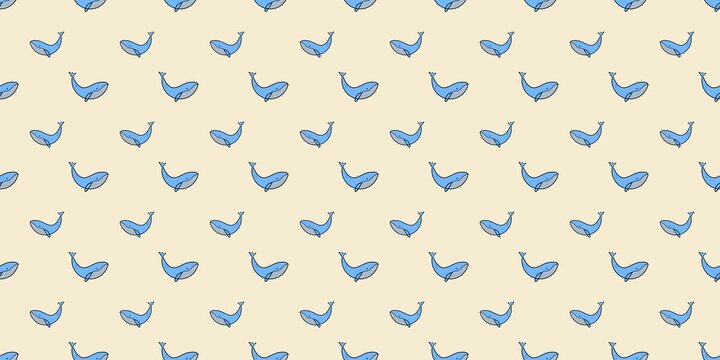 Cute whale seamless pattern on a soft cream background. Hand drawn style  design for baby shower, fabric, or stationery.