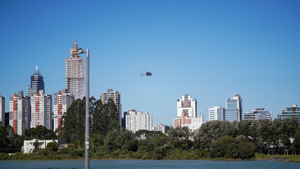 Curitiba skyline with helicopter © Endrio