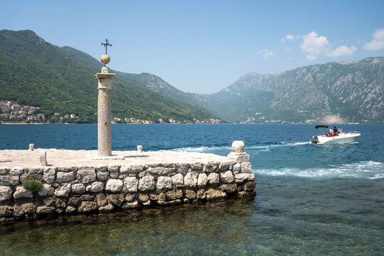 Pier on Our Lady of the Rocks island in the Bay of Kotor, in Perast, Montenegro