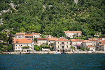 Obraz premium The town of Perast, Montenegro along the coast of the Bay of Kotor, off the Mediterranean Sea
