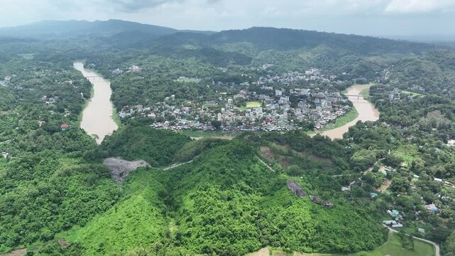 Aerial view flying over rangamati cityscape and kaptai lake